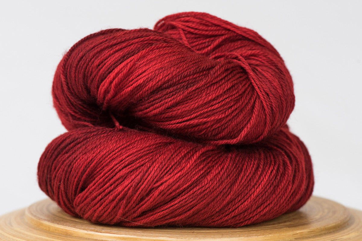 Canneberge semi-solid rich red fingering weight hand-dyed yarn