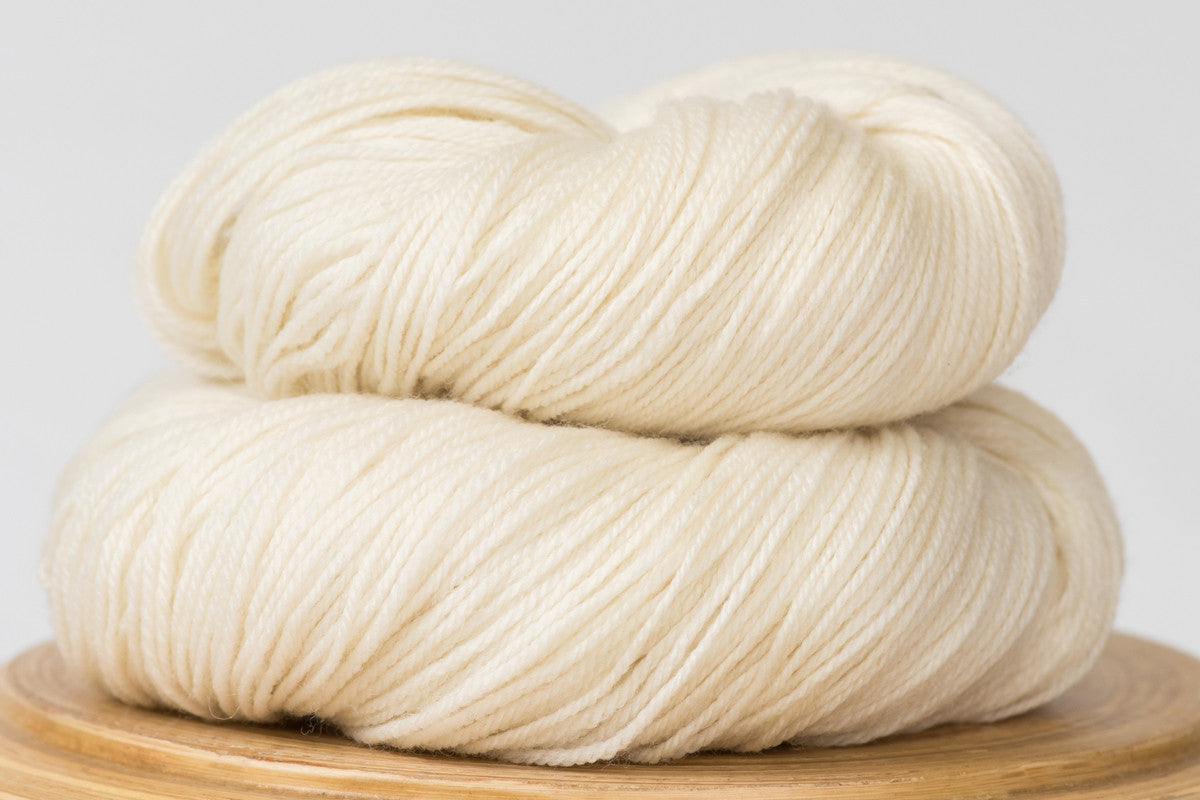Natural off-white superwash merino fingering weight hand-dyed yarn