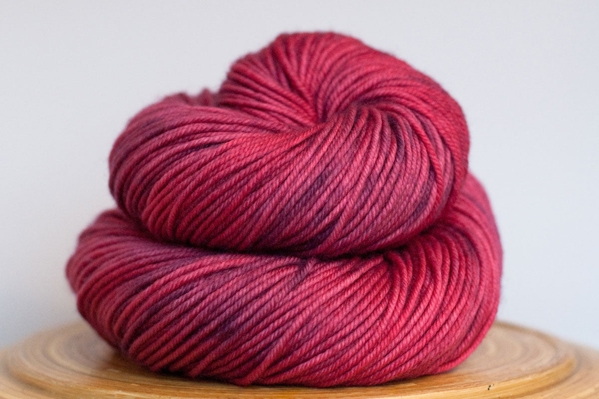 Cosmopolitan bright pink semi solid DK weight hand-dyed yarn