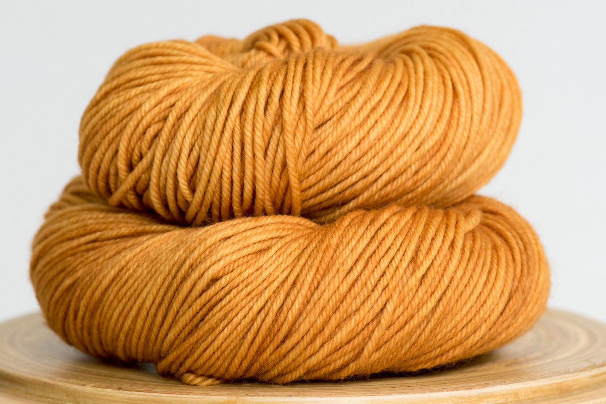 Harvest moon gold semi solid DK weight hand-dyed yarn