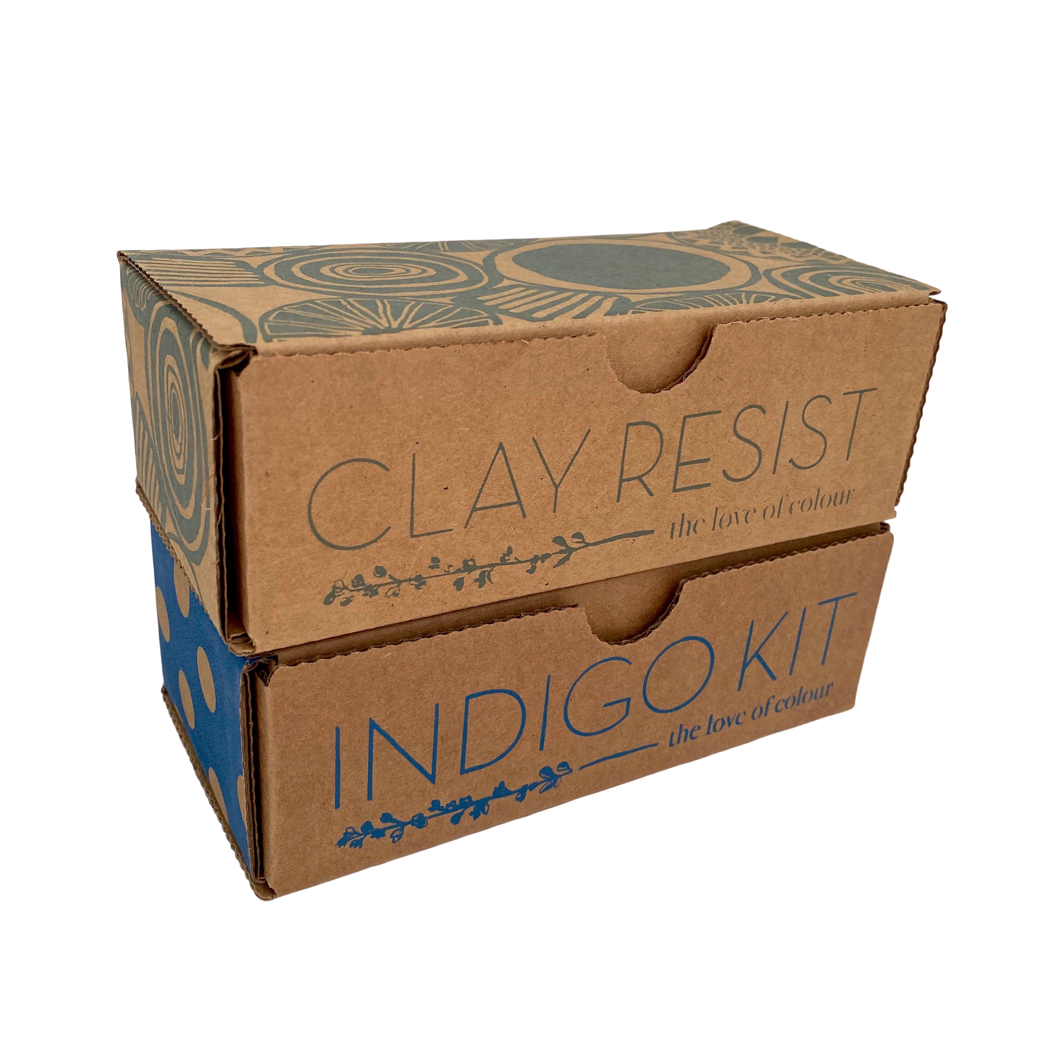 Clay resist and indigo dye kits stacked together