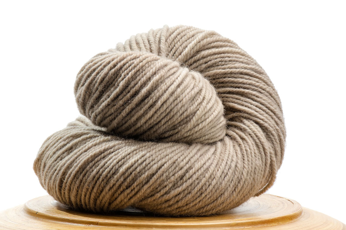 Sutton Canadian hand-dyed yarn in Shiitake, a warm pale neutral