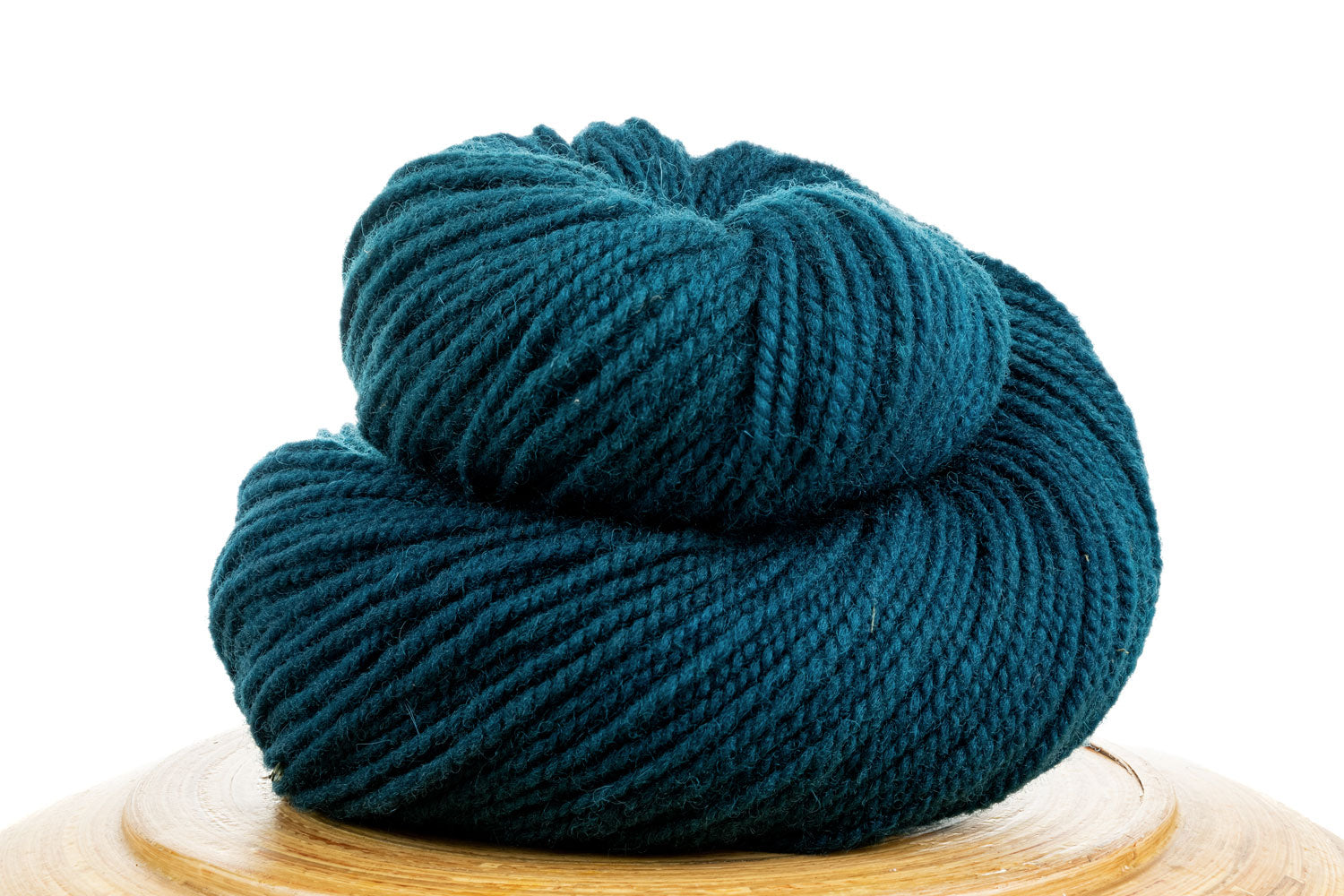 Winfield Canadian hand-dyed yarn in Enchanted River, a dark teal