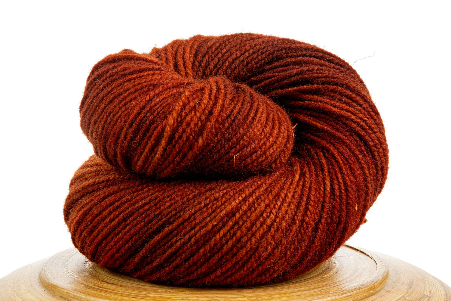 Winfield Canadian hand-dyed wool yarn in Sugar Maple, a deep orange