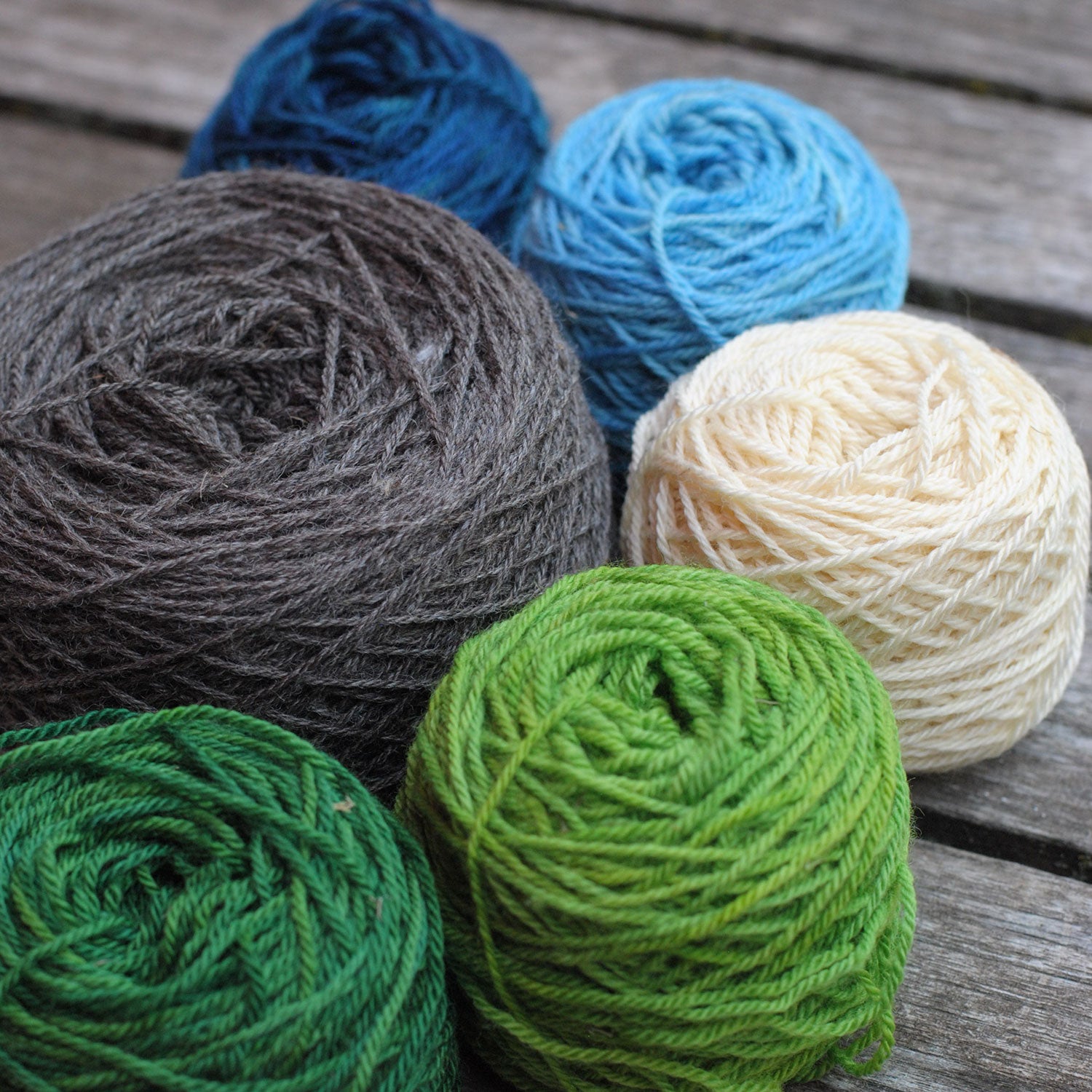 Skeins of yarn wound up into cakes